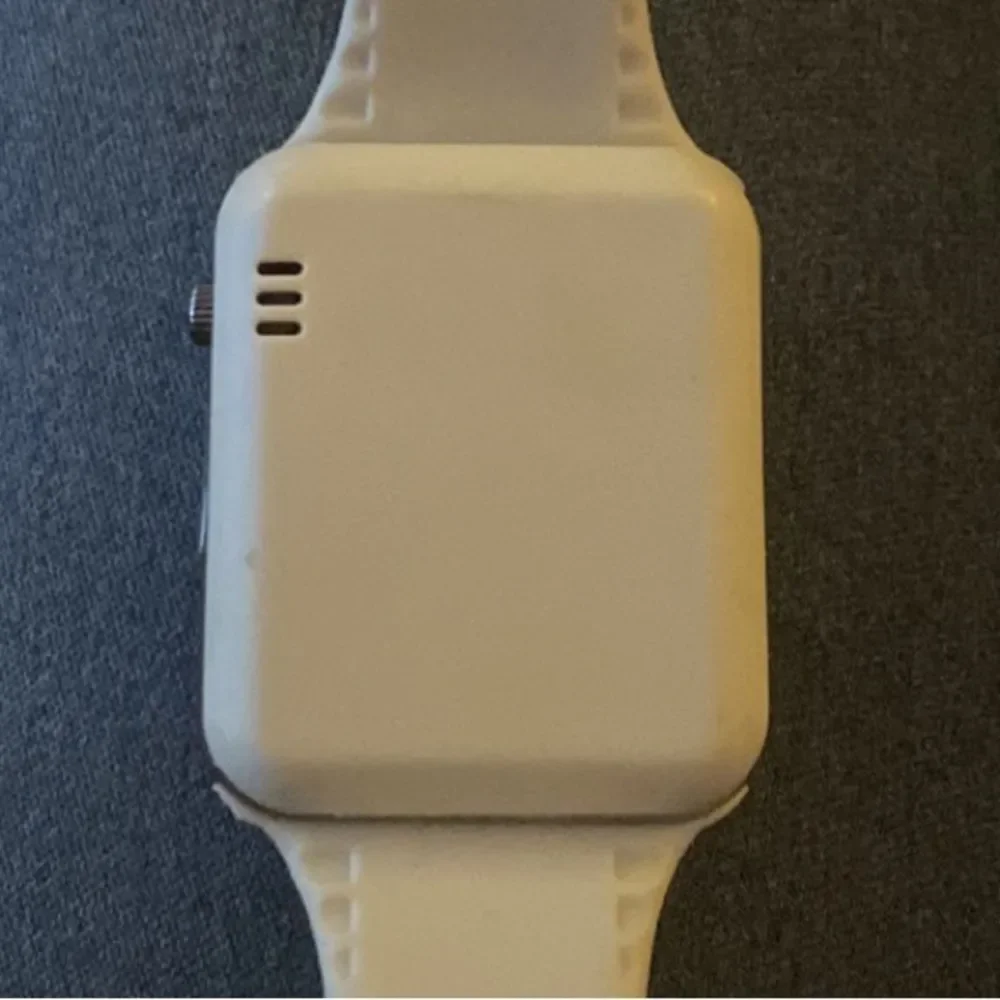 White Smart watch with camera facebook connect, email, text, and music